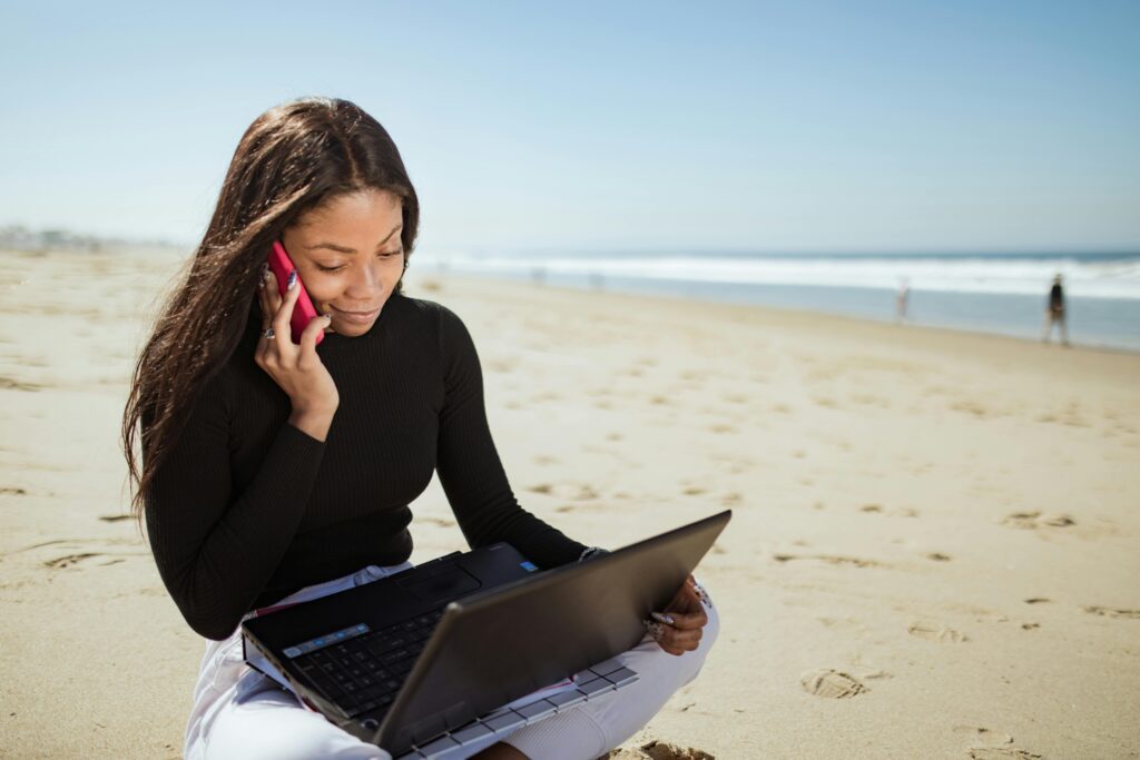 digital nomad working beach